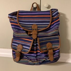 Multi colored striped/pleather backpack!